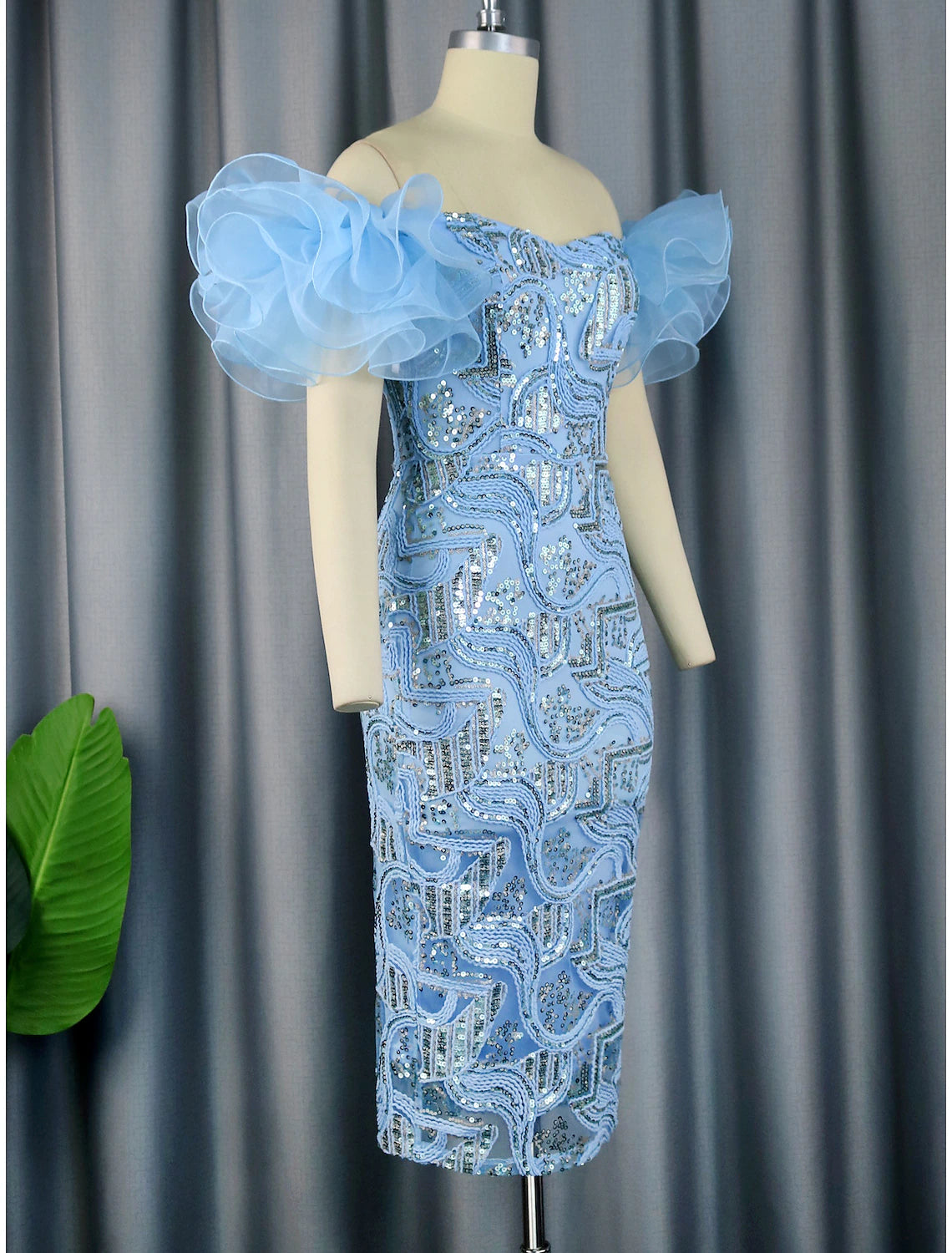Back view of the off-shoulder sheath party dress.