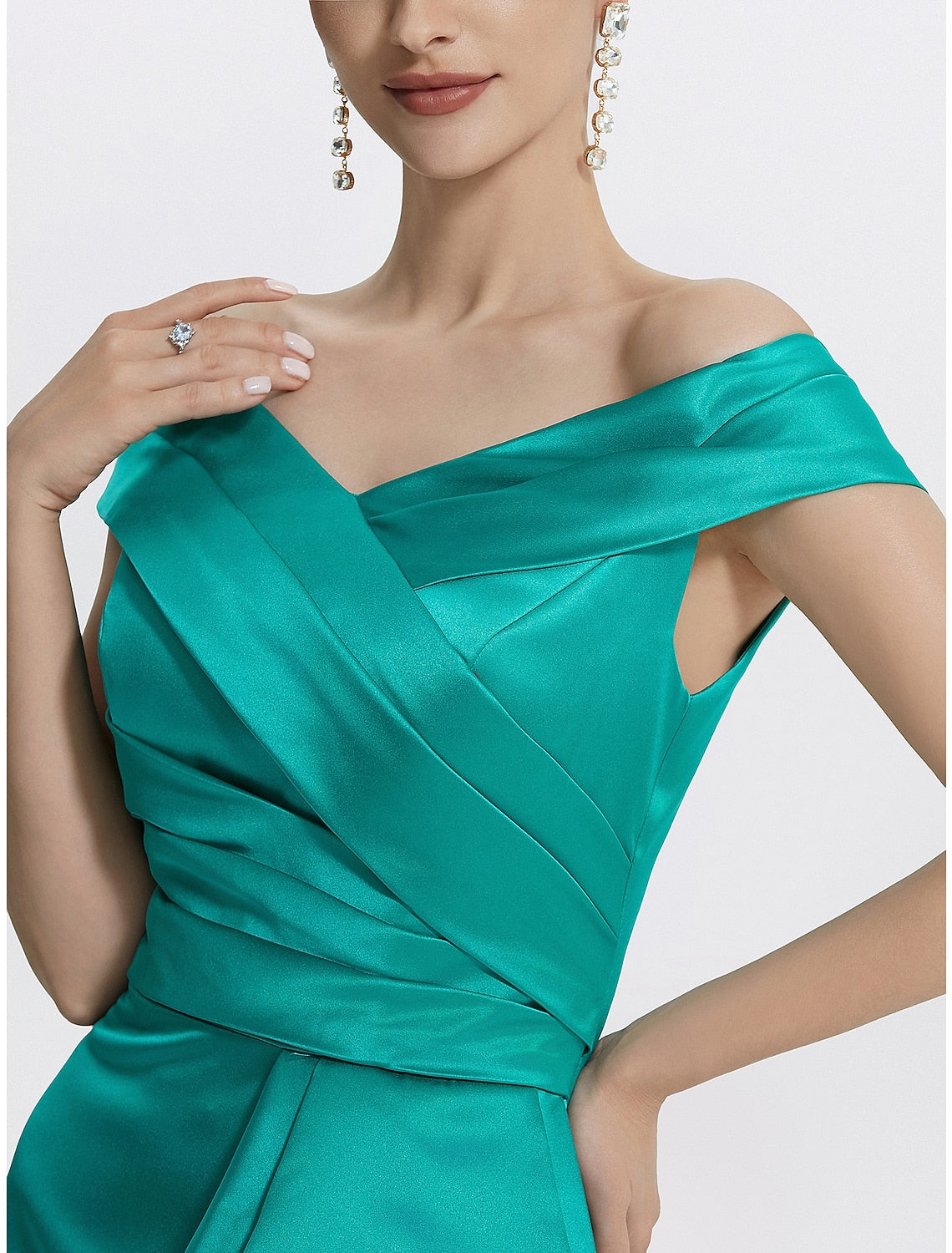 Elegant off-shoulder satin evening gown with ruffles.