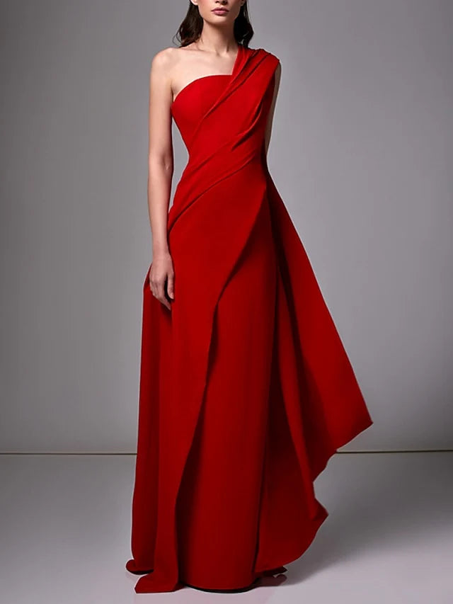 Woman wearing a one-shoulder sheath evening dress.