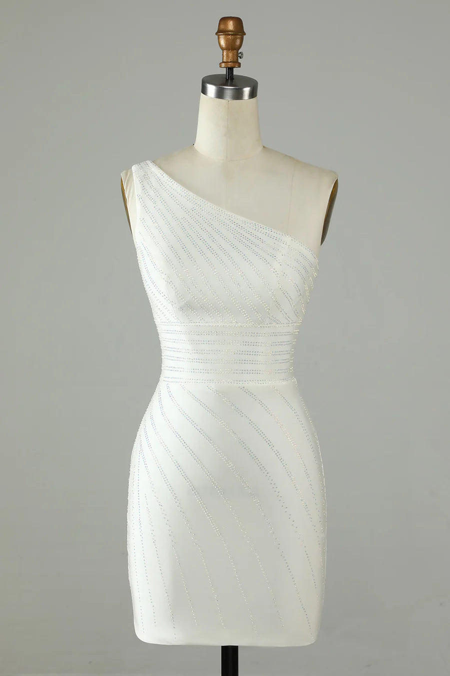 Model wearing an elegant light-colored sheath one-shoulder beaded homecoming dress.