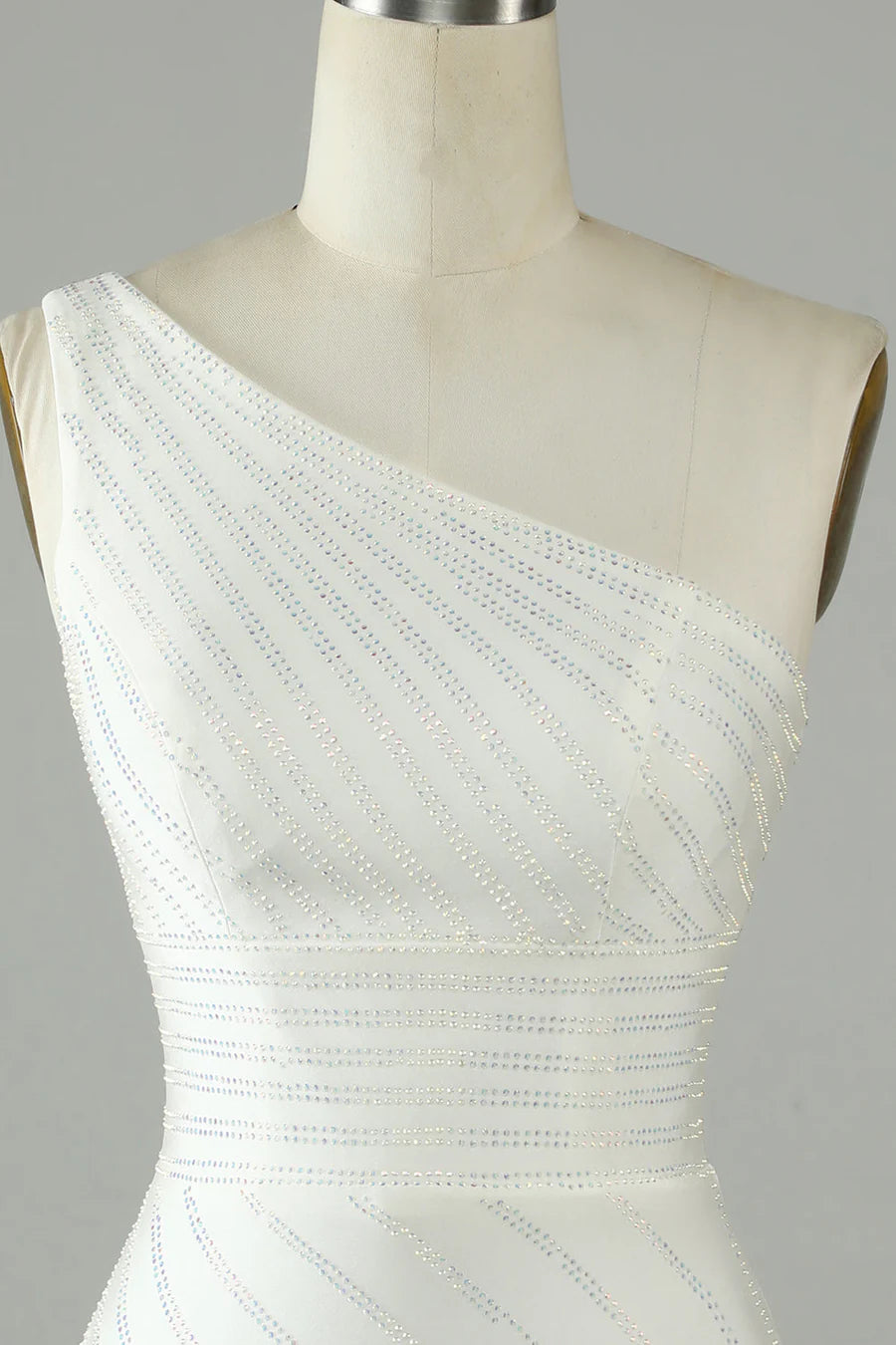 Side profile of the woman in the short sheath homecoming dress.