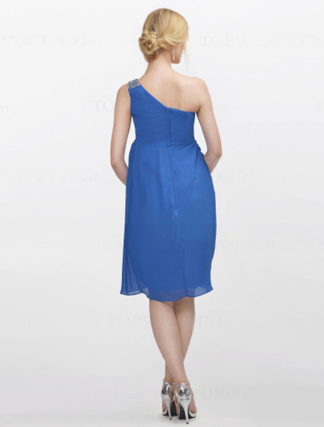 Close-up of the one-shoulder neckline and crystal details on the chiffon bridesmaid dress.