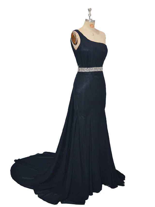 Back view of the one-shoulder chiffon evening gown with ruched detailing.