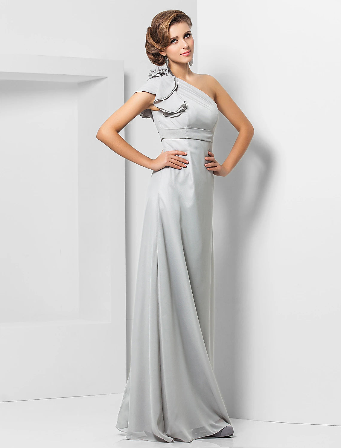 Side profile of a chiffon bridesmaid dress with a sash.