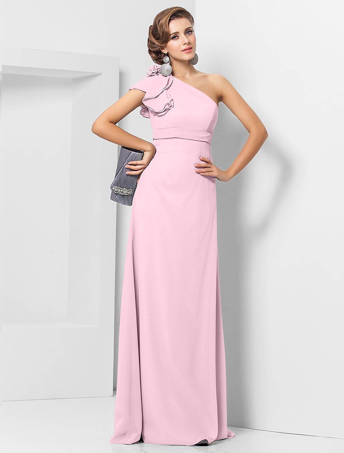 Flowing hemline of a floor-length chiffon formal dress.