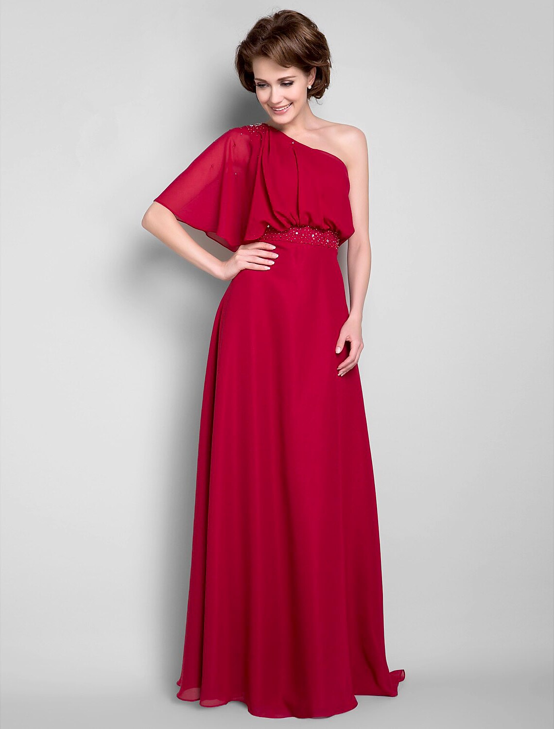 Elegant Mother of the Bride dress with one shoulder and half sleeve, featuring beading and draping details.