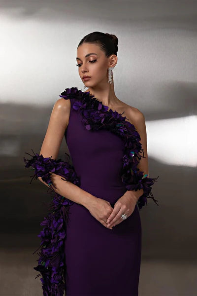 Back view of the long purple sheath prom dress, showcasing its elegant silhouette.