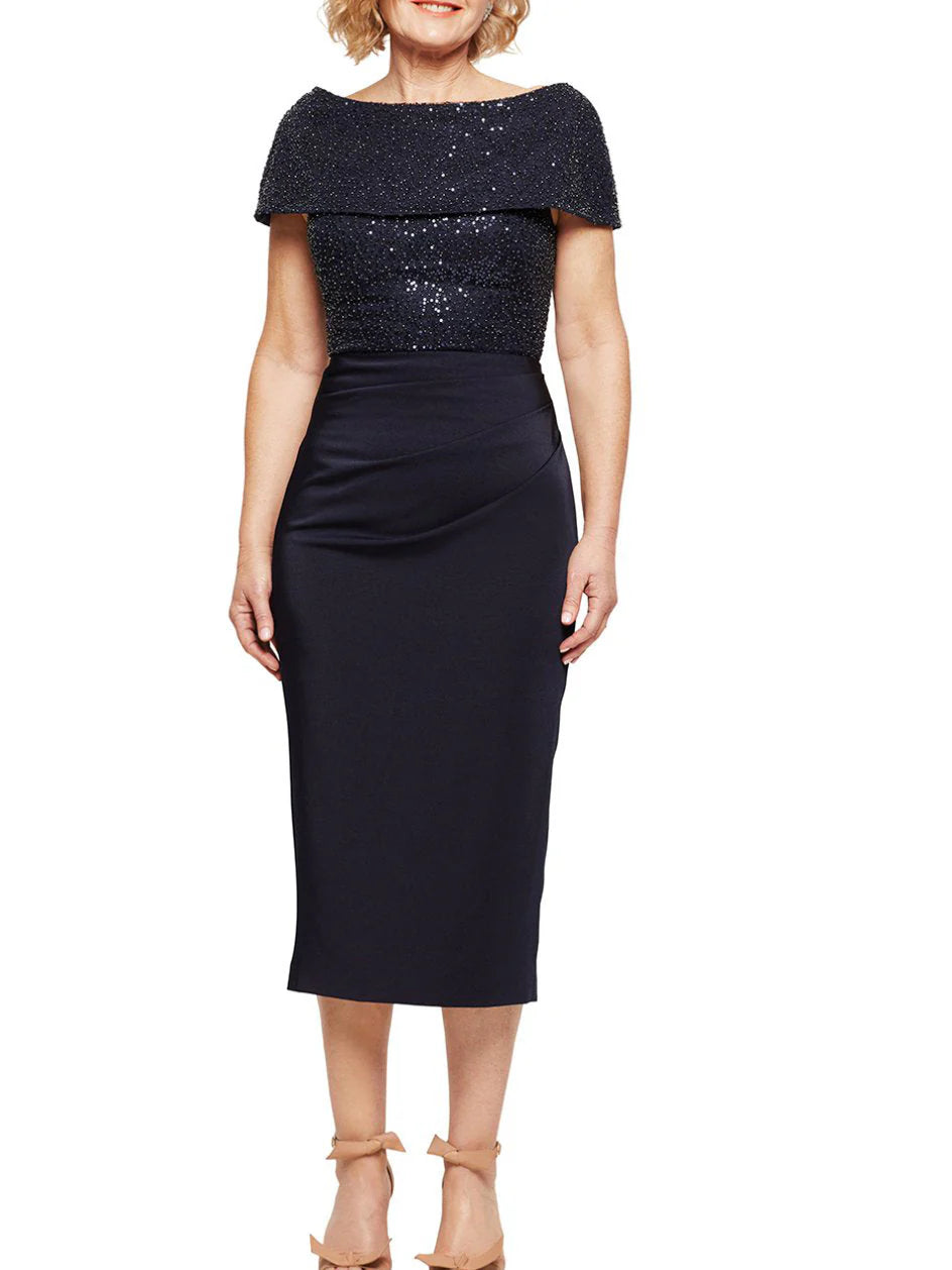 Elegant navy blue sequined sheath dress with a round neck, knee-length, suitable for formal occasions.