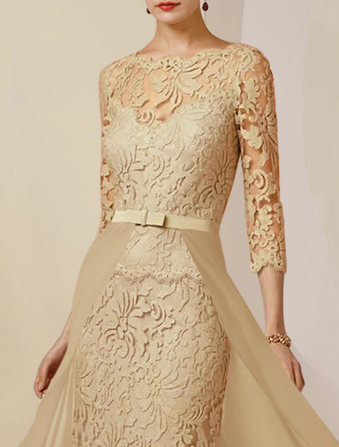 Full length view of a Mother of the Bride dress with elegant silhouette.