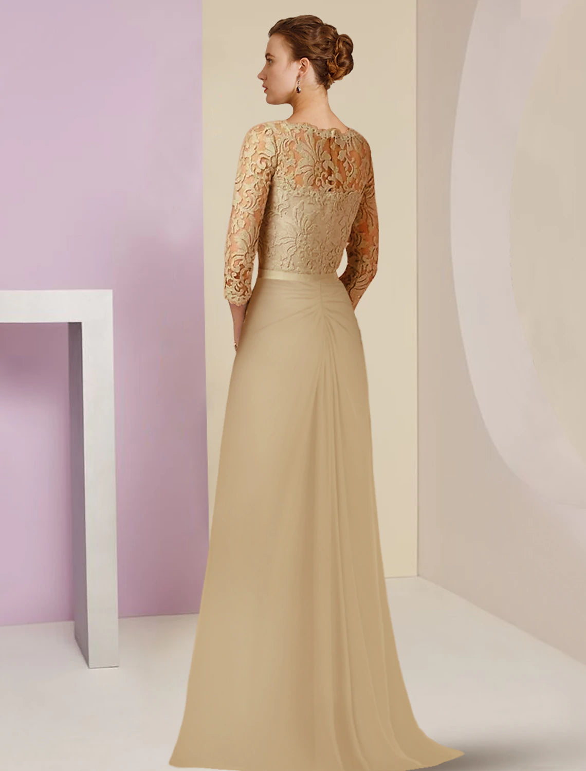 Detail of chiffon lace fabric and bow appliques on a formal dress.