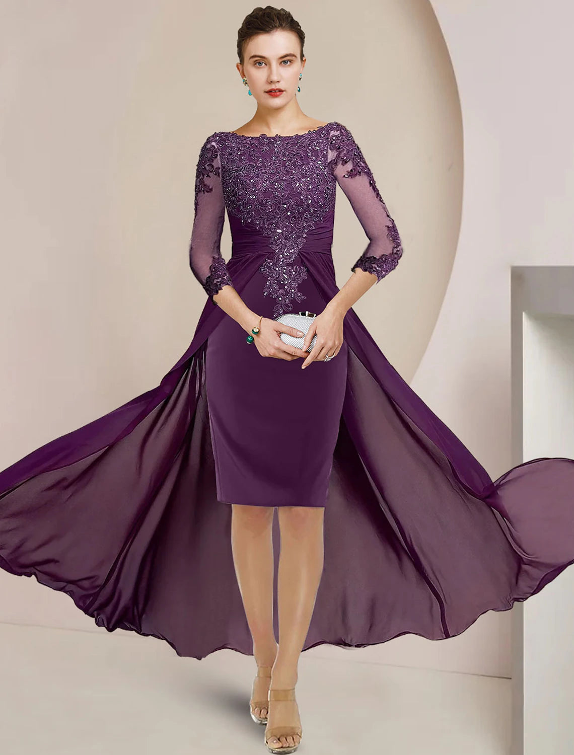 Elegant Mother of the Bride sheath dress with scoop neck and 3/4 sleeves.