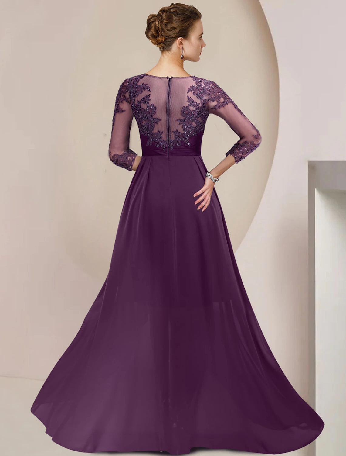 Close-up of the chiffon lace Mother of the Bride dress with beading and sequin appliques.