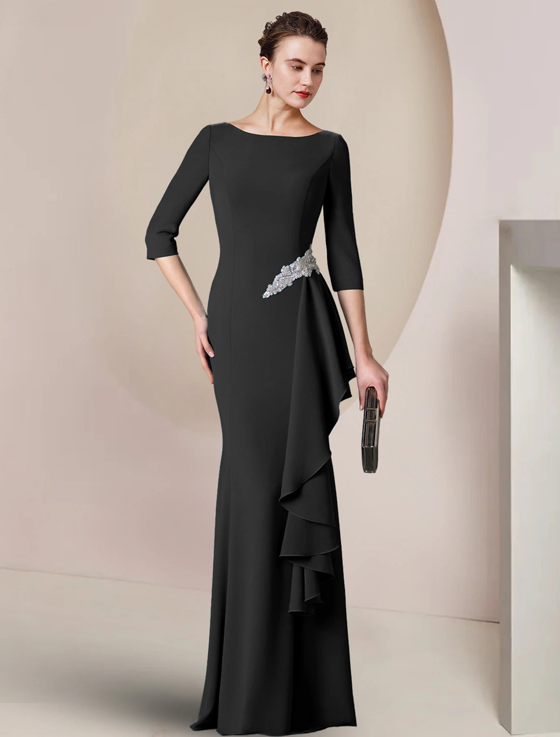 Back view of the elegant sheath dress, showcasing the flattering ruching detail.