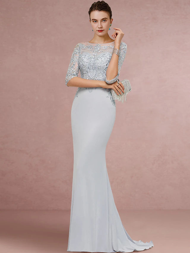 Side view of a vintage-inspired formal dress with sweep train.