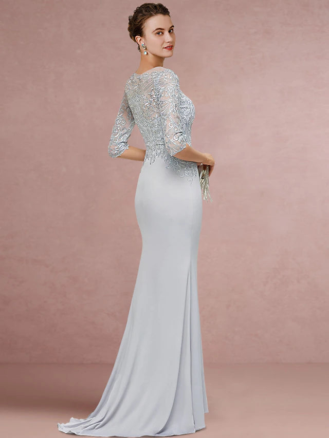 Close-up of lace and sequin details on a half sleeve dress.