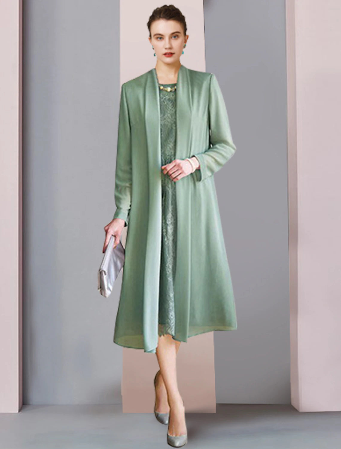 Elegant two-piece Mother of the Bride dress featuring a scoop neck, 3/4 sleeve lace jacket, and tea length chiffon skirt.