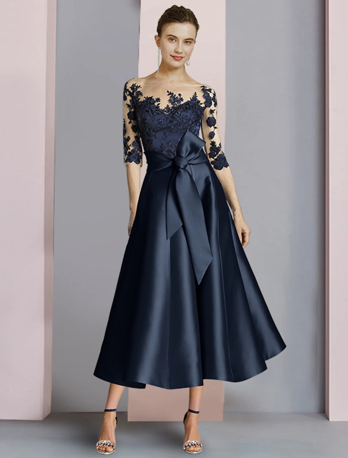 Elegant sheath Mother of the Bride dress with scoop neck and half sleeves.