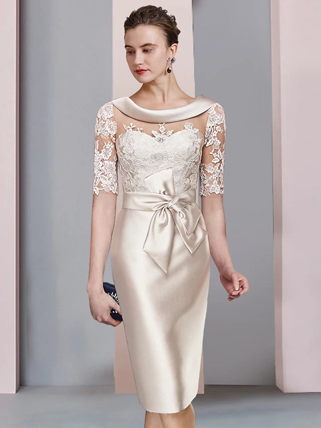 Elegant knee-length sheath dress with scoop neck and half sleeves, featuring lace and bow details.