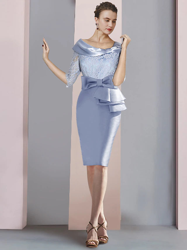 Elegant knee-length sheath dress with scoop neck and half sleeves.