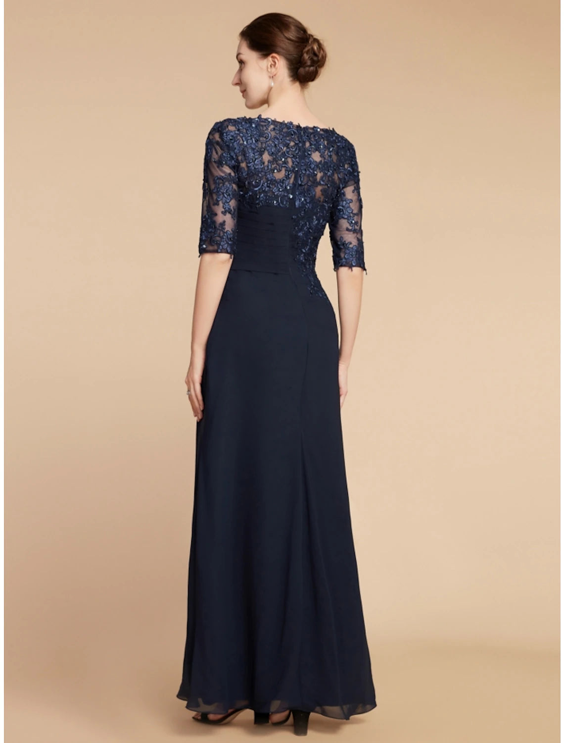 Back view of ankle-length chiffon and lace dress with sequin ruching.