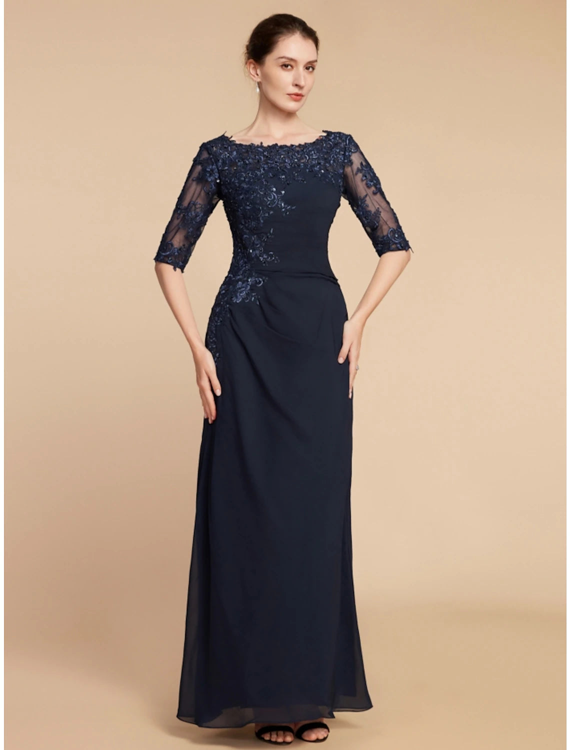 Close-up of sequin ruching and lace detail on a formal dress.
