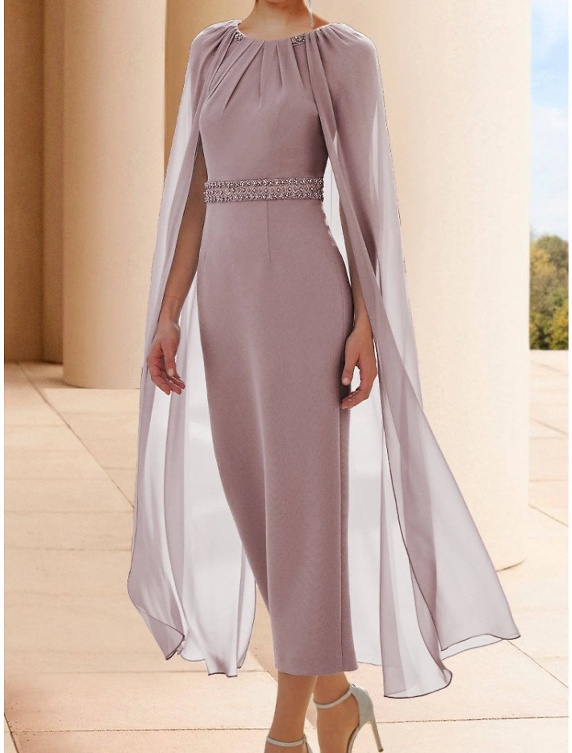 Back view of an elegant ankle-length chiffon mother of the bride dress.