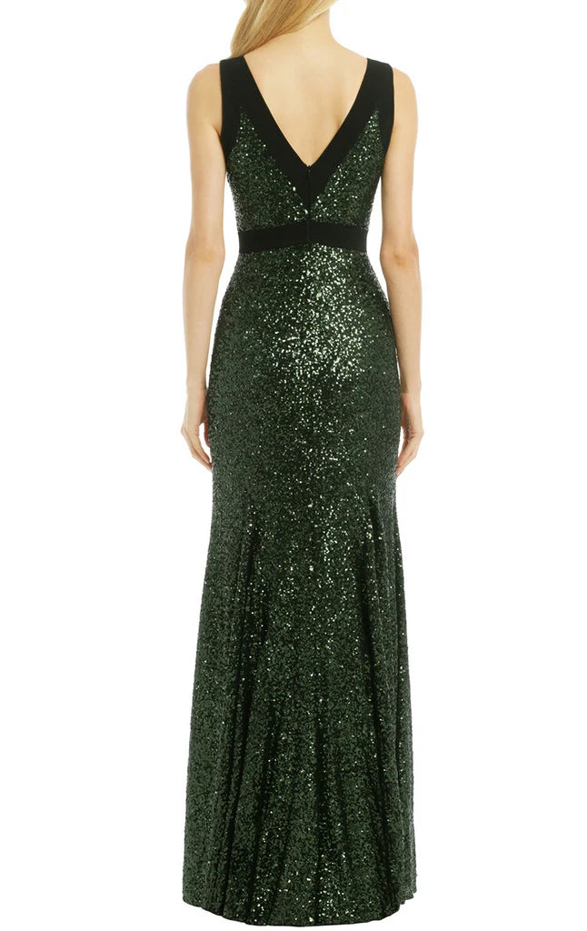 Back view of the dark blue sequin sheath gown.
