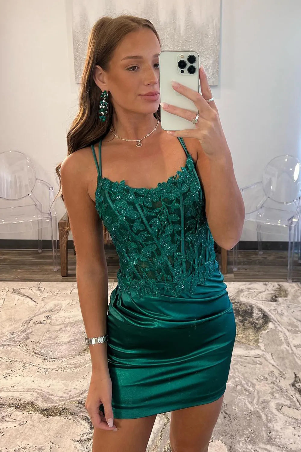 Elegant sheath homecoming dress with spaghetti straps and appliques.