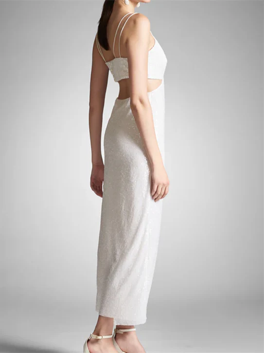 Side profile of a woman showcasing a formal sheath dress.