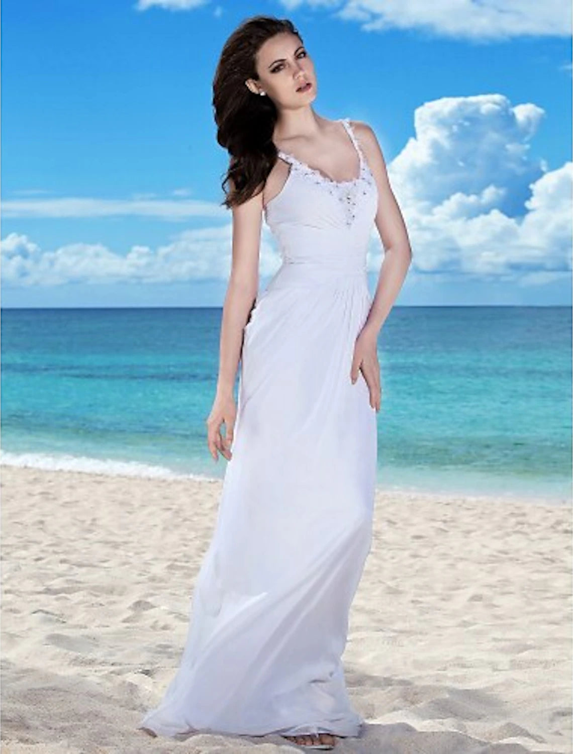 Full view of a flowing chiffon bridal gown.