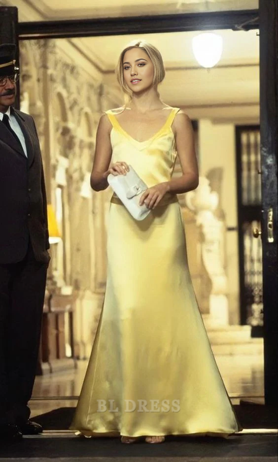 Elegant yellow satin sheath dress with spaghetti straps.
