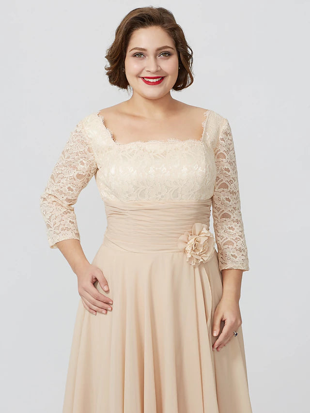 Side view of the elegant chiffon and lace Mother of the Bride dress.