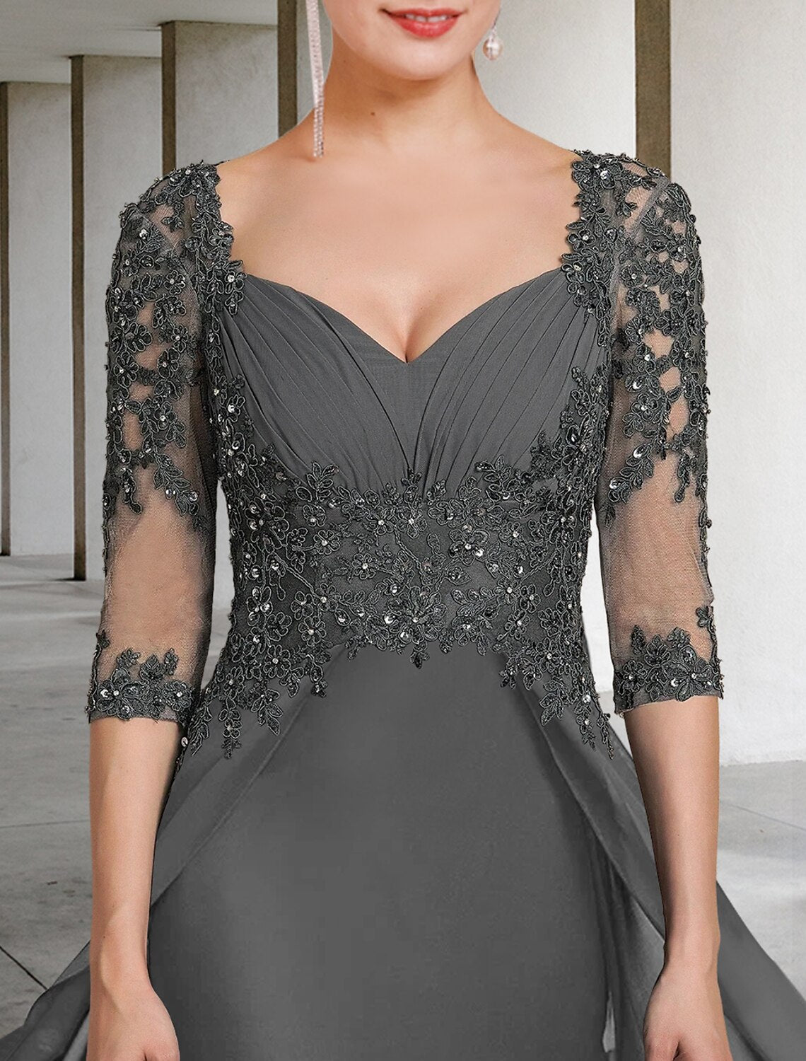 Side view of the elegant floor-length chiffon lace mother gown.