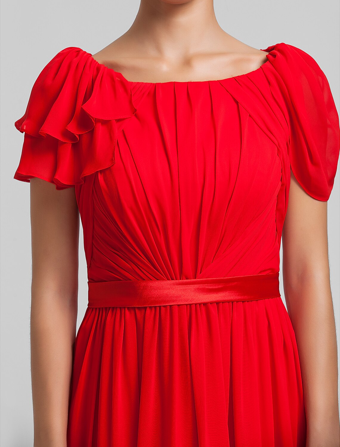 Side view of an elegant chiffon dress highlighting the delicate draping.