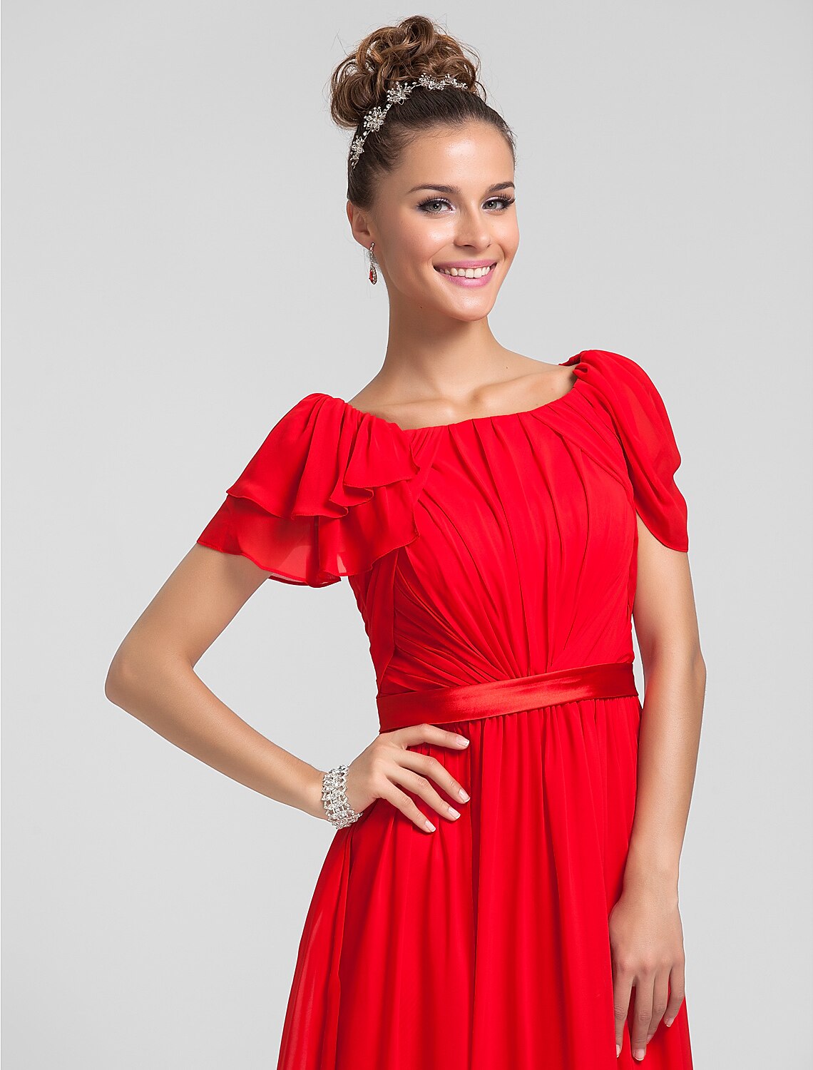 Chiffon dress with square neckline and elegant flowing skirt.