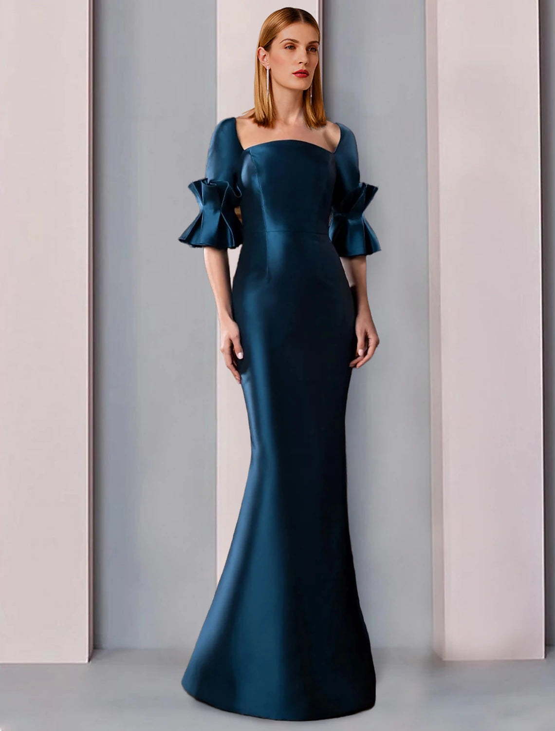 Elegant satin sheath dress with square neck and ruched half sleeves.