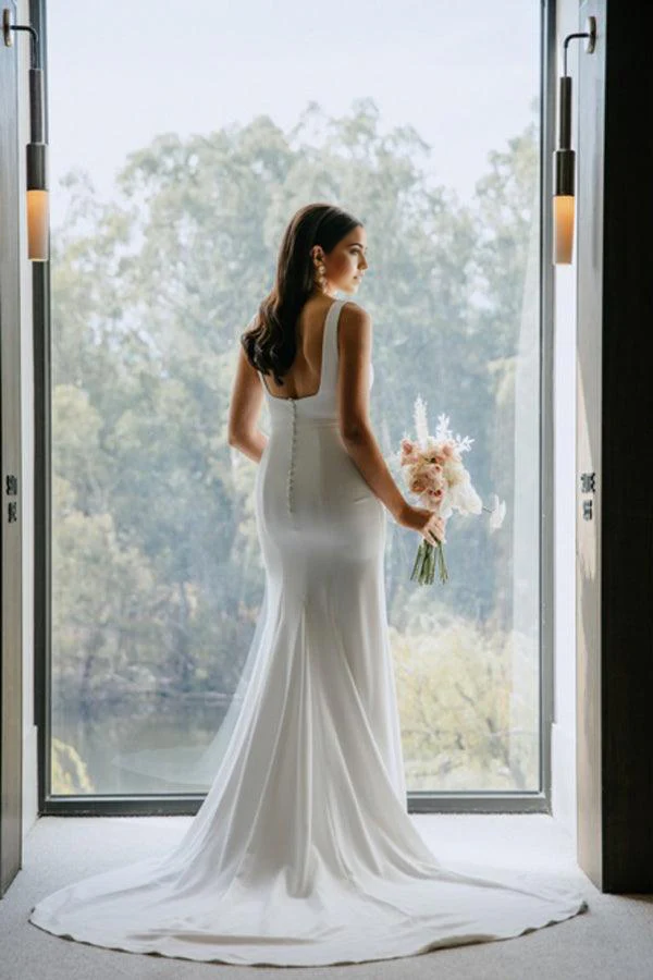 Front view of the modern square neck bridal gown.