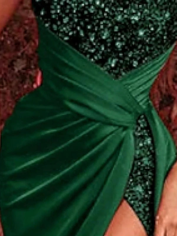 Front view of a model wearing a sophisticated sheath strapless evening dress with a subtle court train.