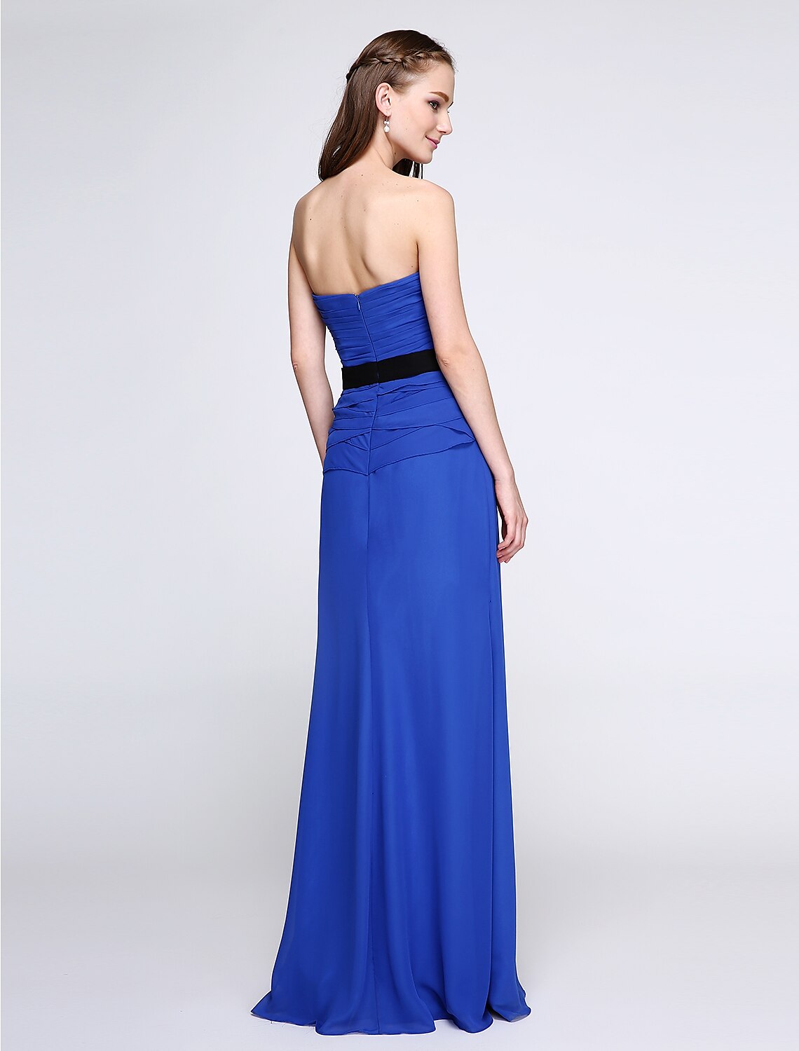 Back view of the elegant floor-length chiffon dress with criss-cross detail.