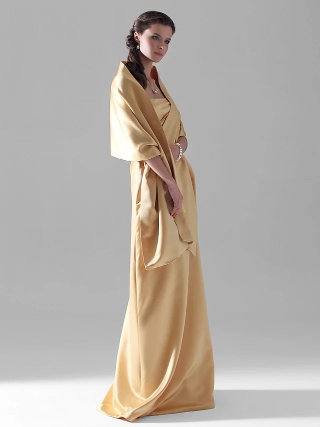 Back view of a sophisticated strapless satin bridesmaid dress.