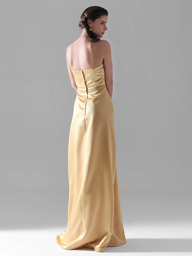 Model wearing the strapless satin bridesmaid dress with a matching wrap.