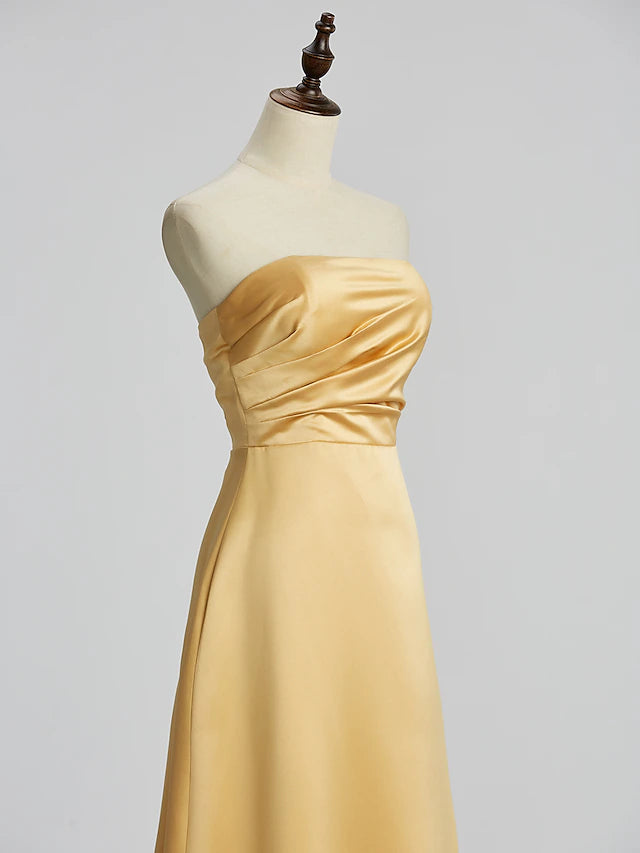 Full length view of the elegant strapless dress, perfect for formal occasions.