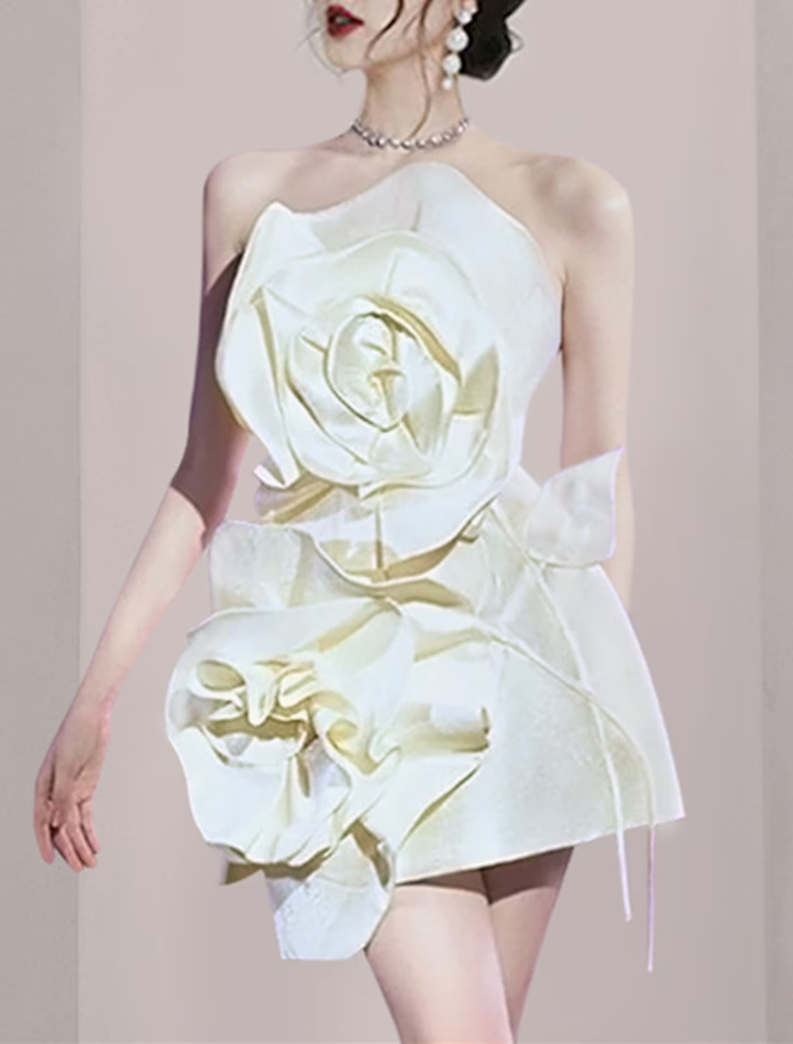 Close-up of the floral pattern and luxurious satin fabric on a party dress.