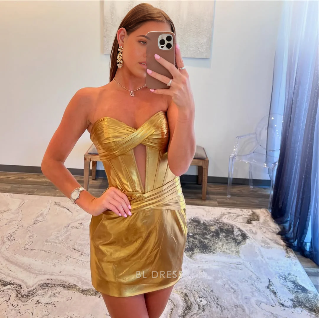 Elegant gold strapless sheath dress on a white background.
