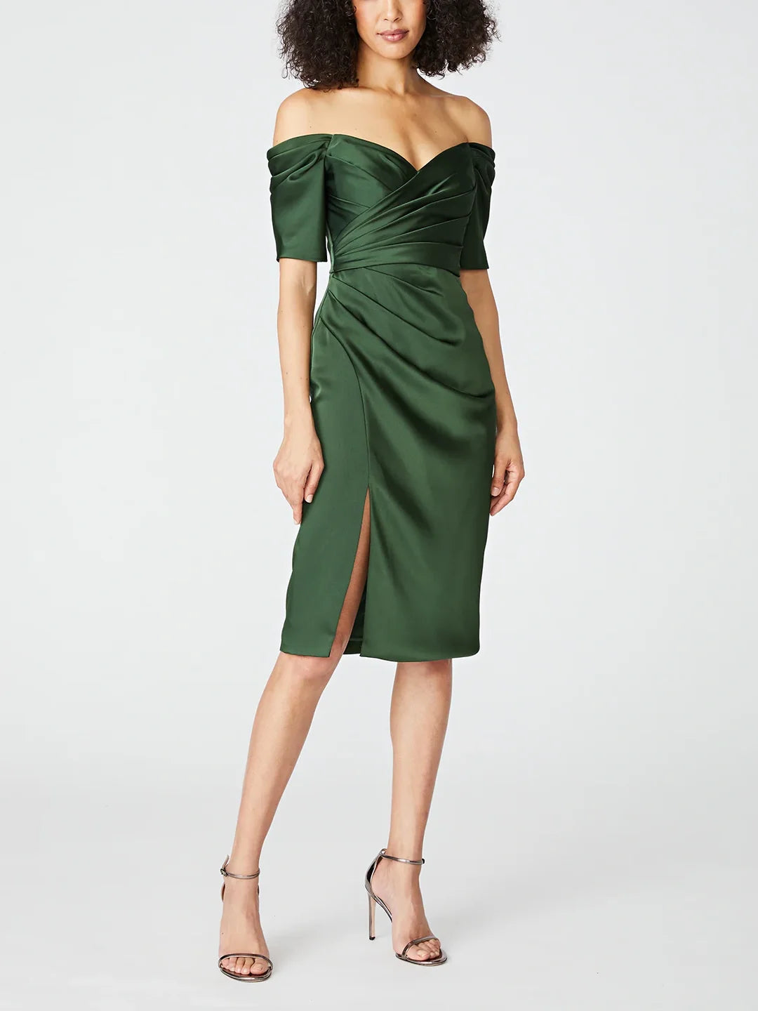 Elegant woman wearing a strapless sheath Mother of the Bride dress.