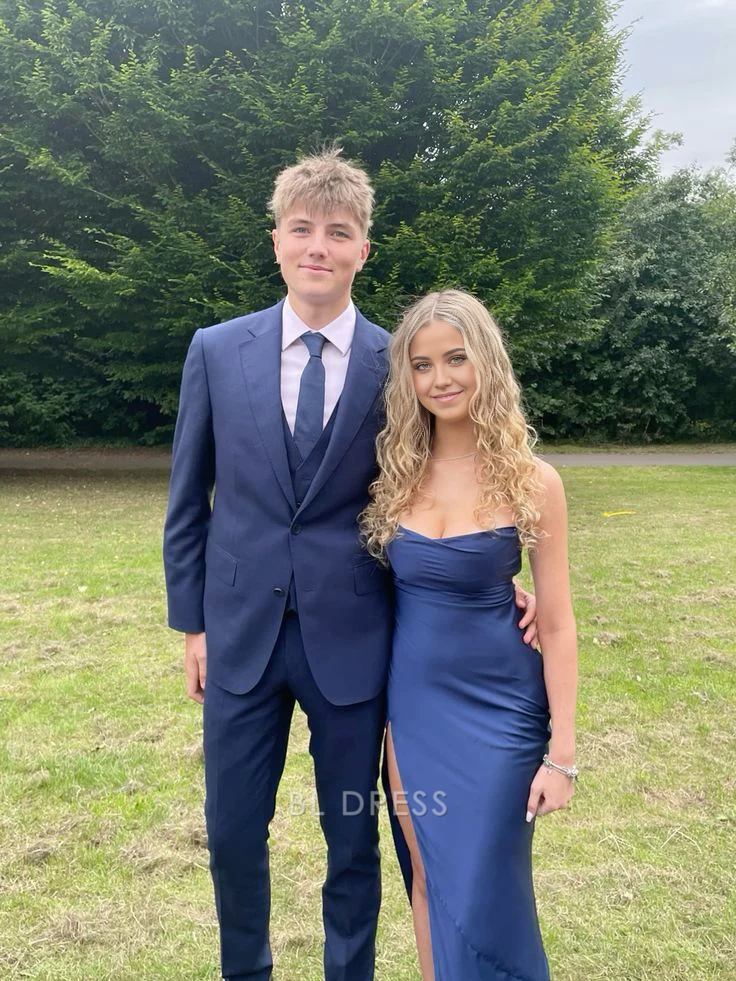 Navy blue strapless sheath formal dress with a high slit.