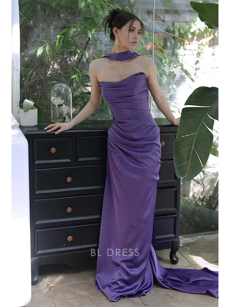 Elegant purple strapless sheath gown for formal events.