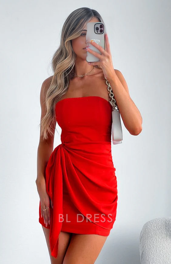 Close-up of the vibrant red strapless formal dress.