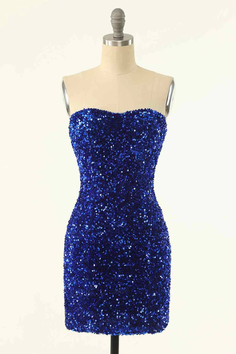 Model wearing a dark sequin strapless sheath homecoming dress, front view.