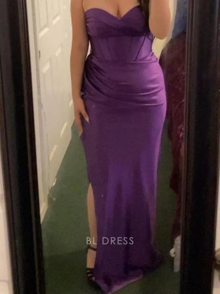 Back view of a purple strapless satin formal dress.